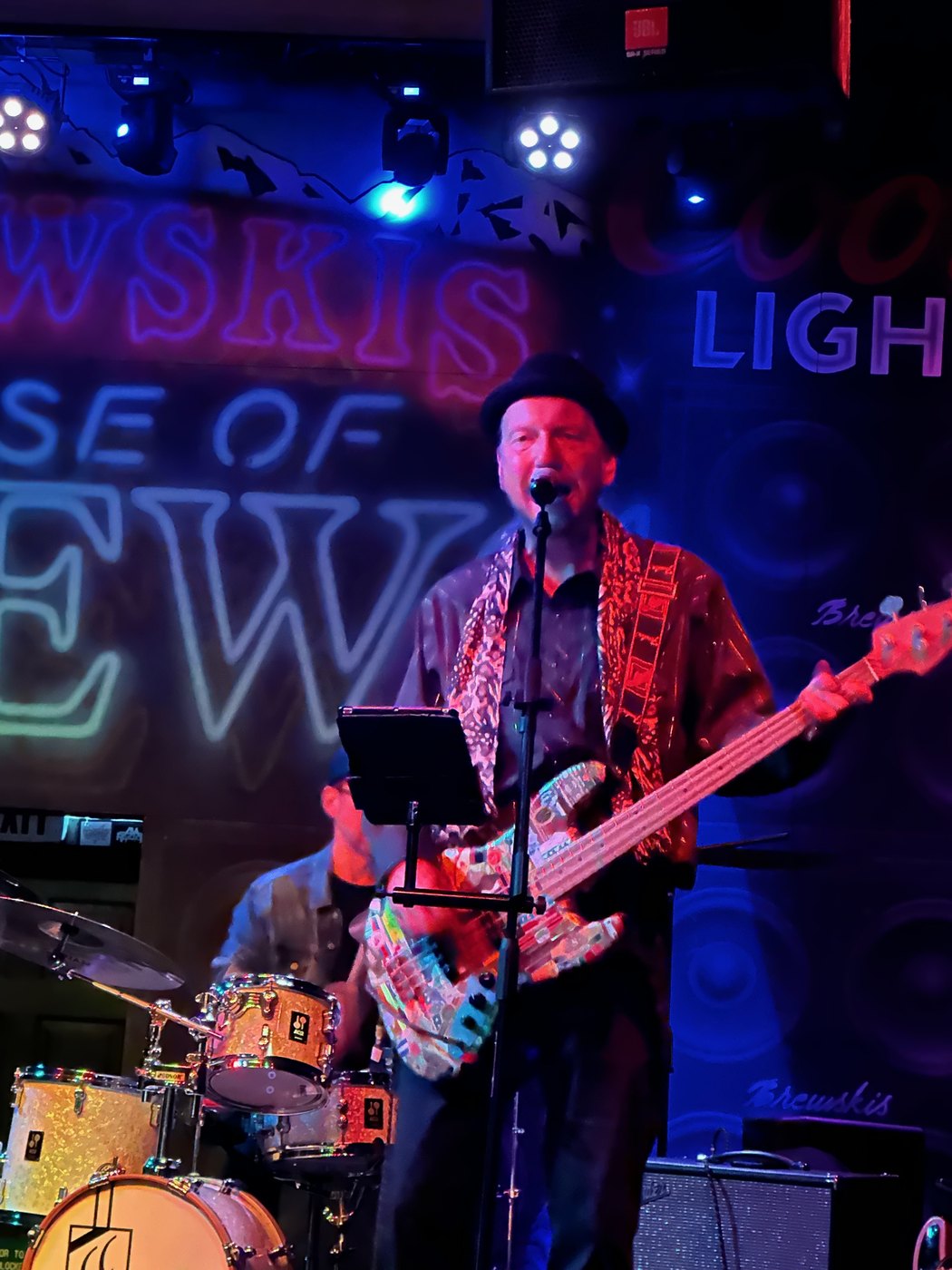 Fab performing on bass and vocals