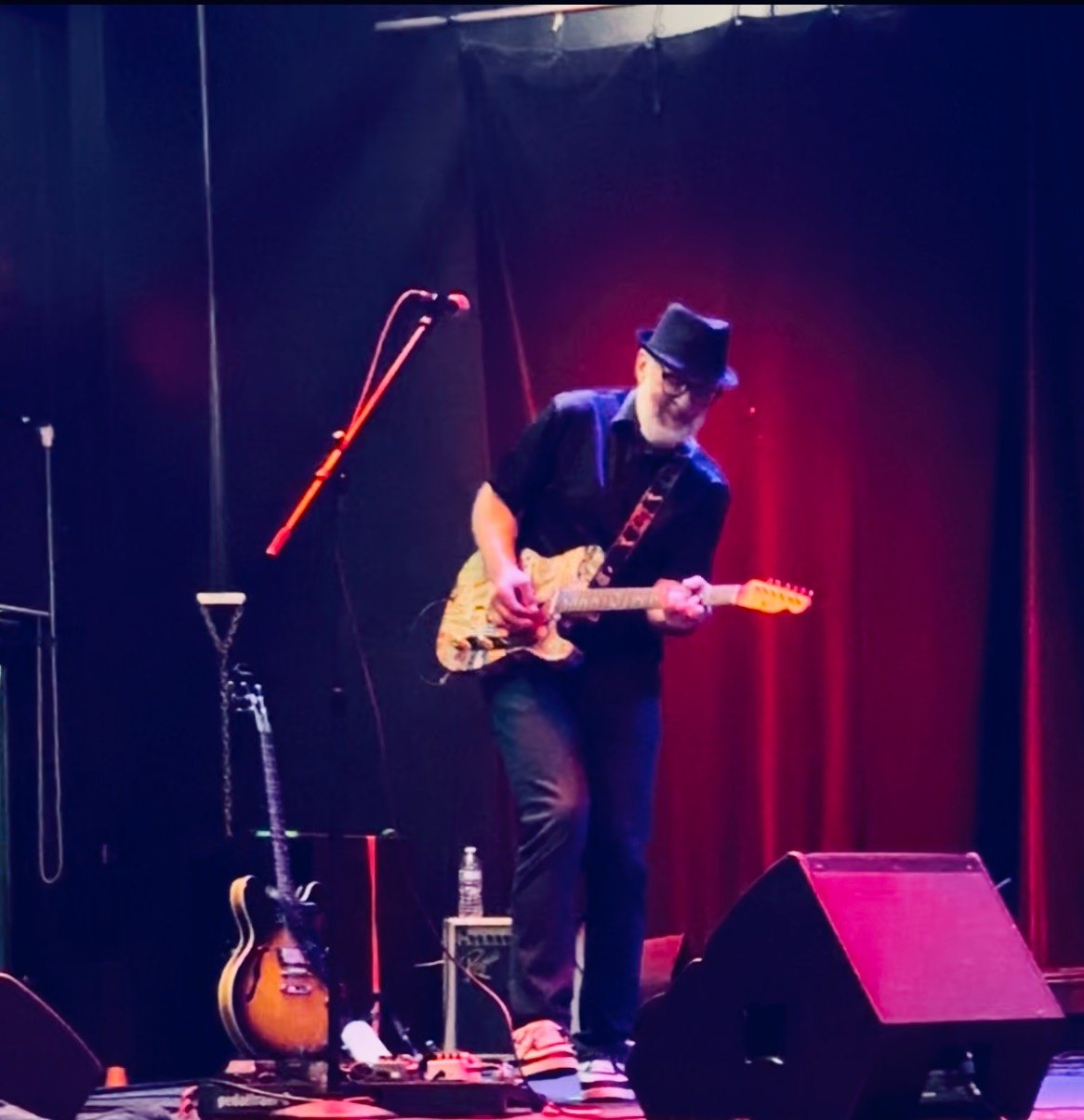 Junior performing on guitar